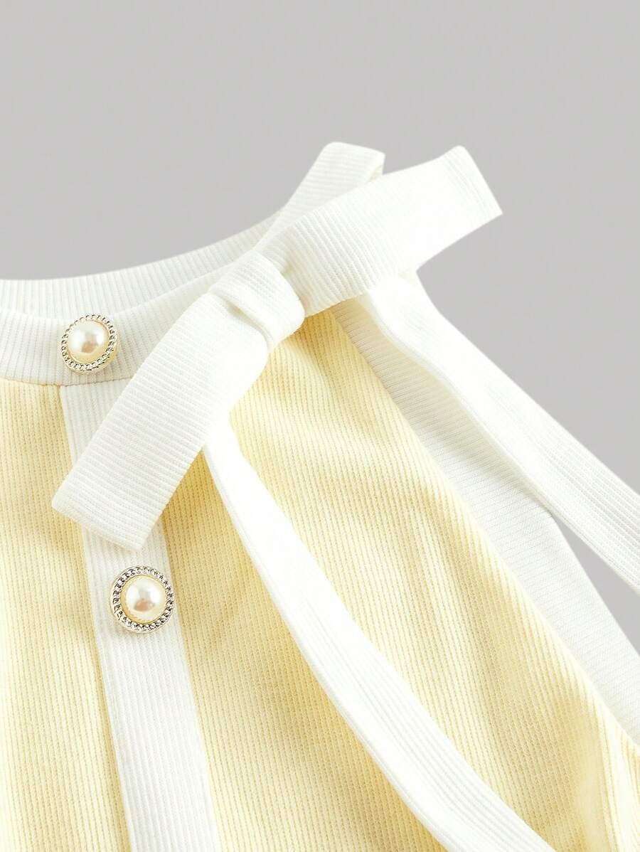 SHEIN فستان أصفر قصير بدون أكمام بتفاصيل أزرار ورباط