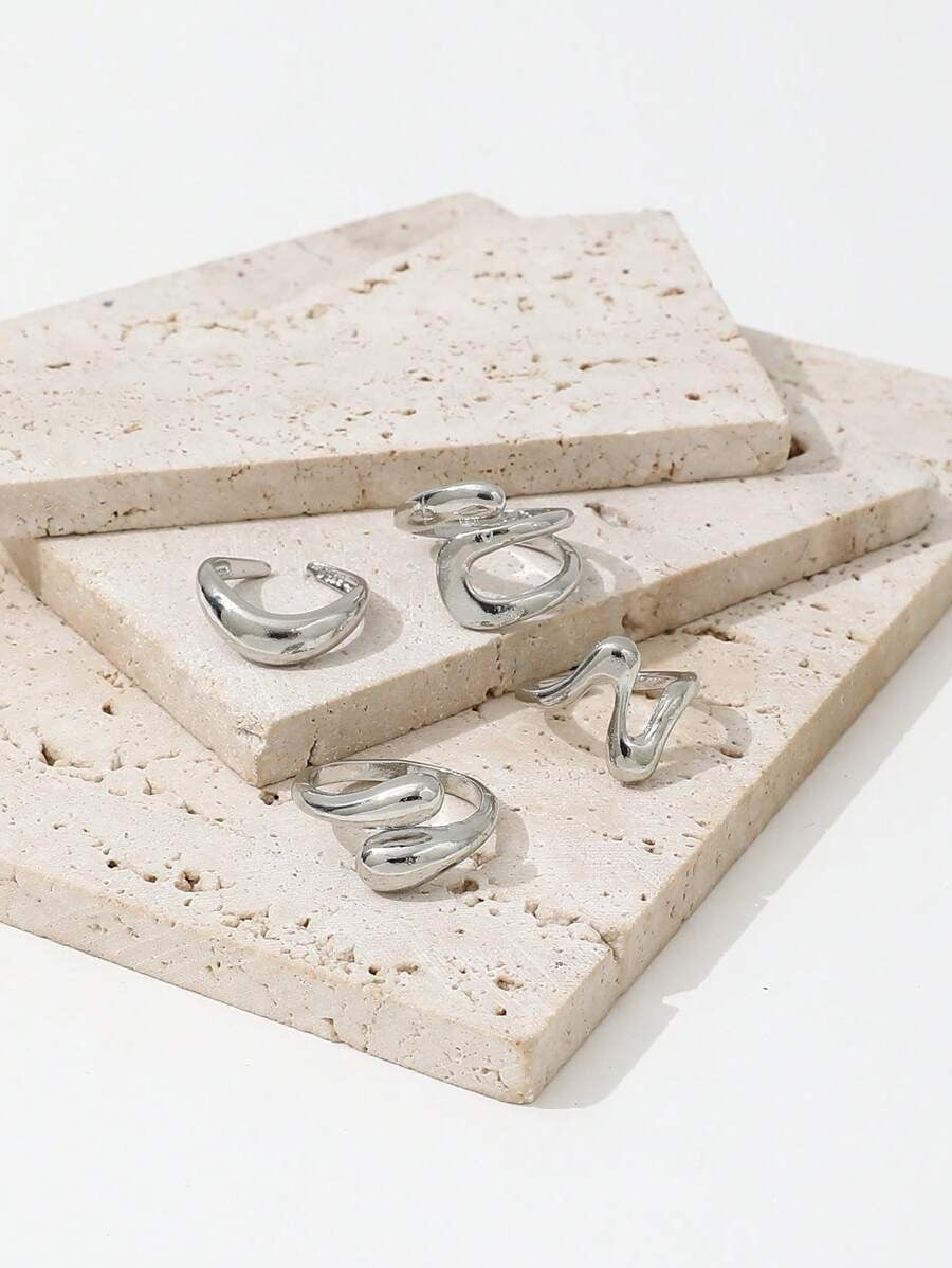 SHEIN مجموعة 4 خواتم فضية بتصميم دائري مفتوح
