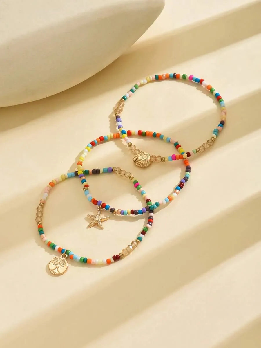 SHEIN أساور كاحل لؤلؤ وخرز ونجمة بحر وقواقع 3 قطع