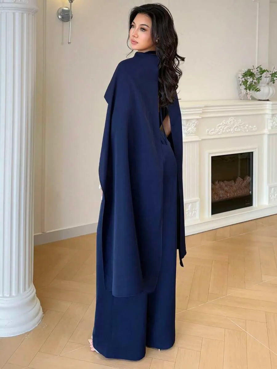 SHEIN Modelyn جمبسوت كحلي أنيق بتصميم بونشو وكاب ملكي من