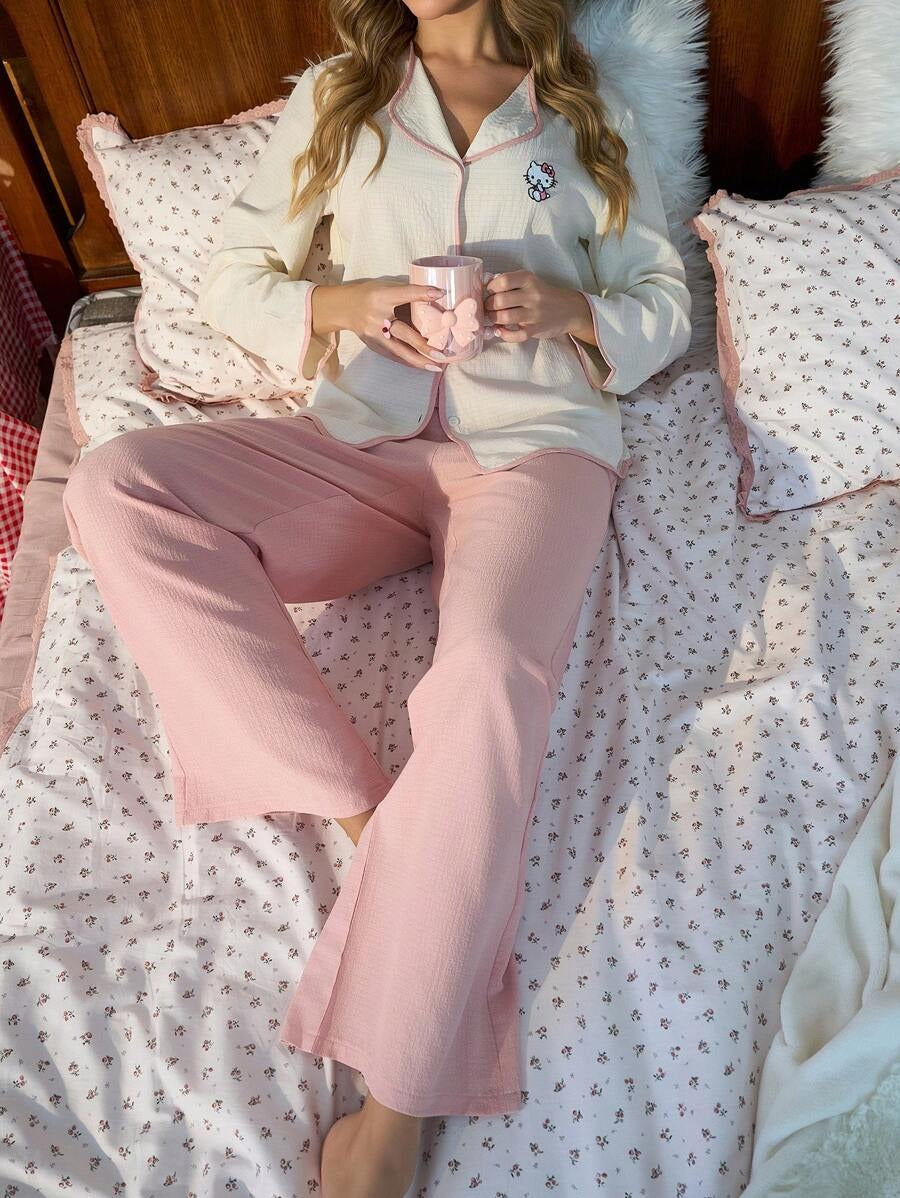 SHEIN Sanrio Hello Kitty  طقم بيجامة نوم مشمشي بطبعة