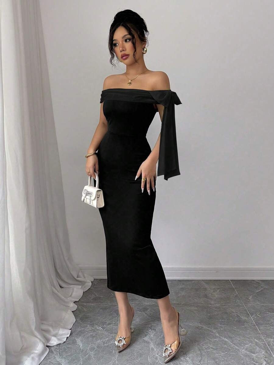 SHEIN Rafferiza فستان طويل أسود بكتف مكشوف مزين بعقدة
