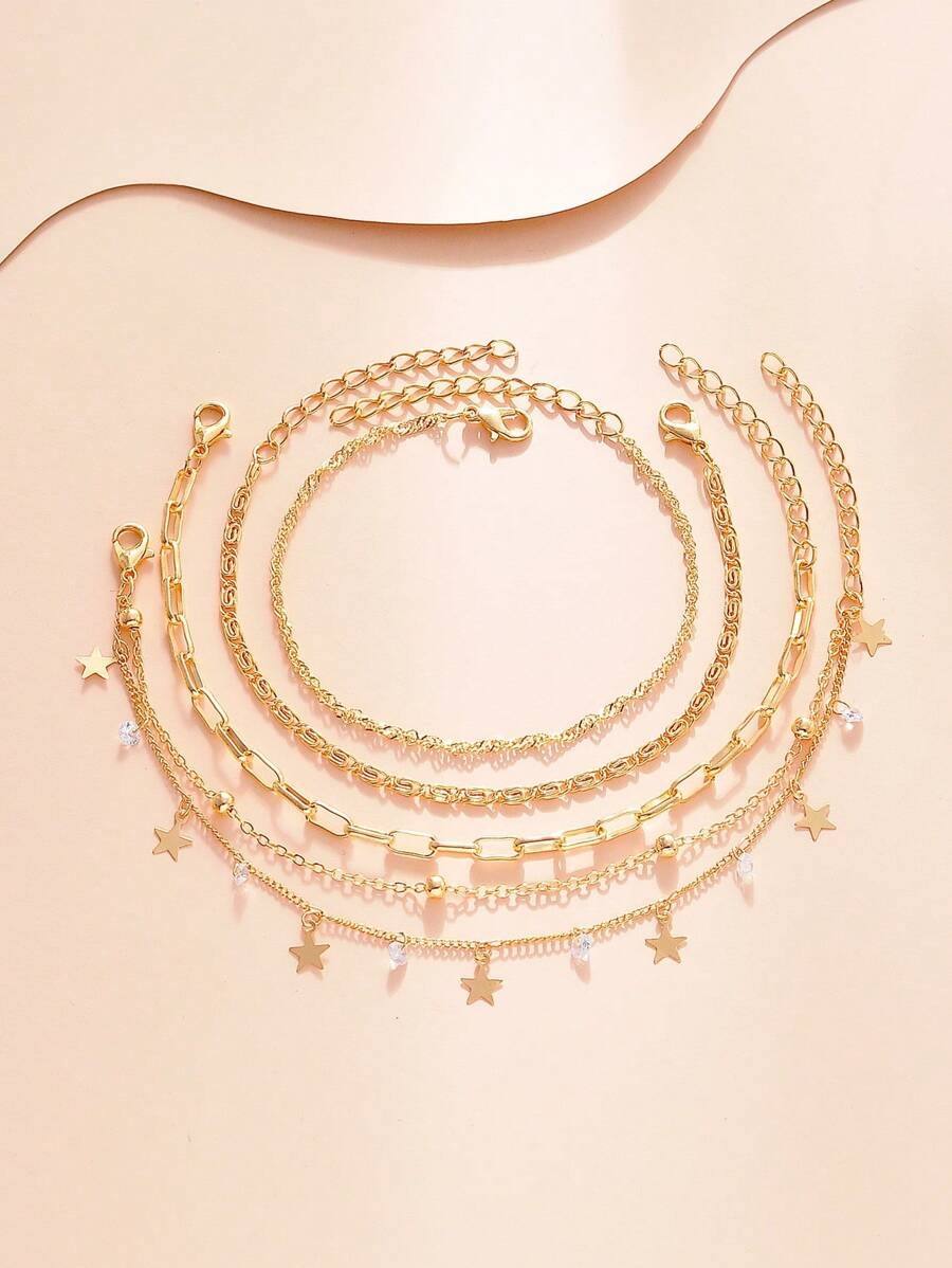 SHEIN طقم 4 اساور ذهبية بزركونيا ونجمة