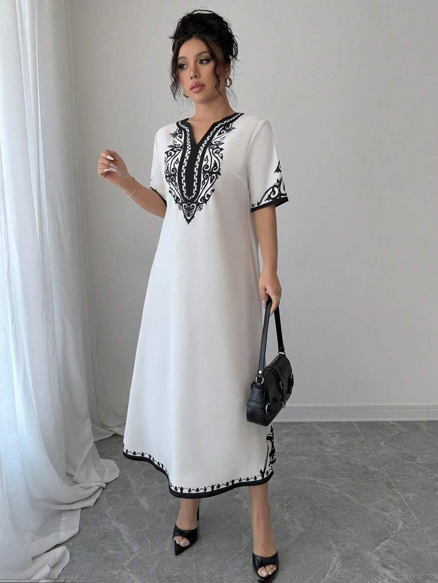 SHEIN Elenzga  فستان أنثوي أبيض بنقشات جذابة
