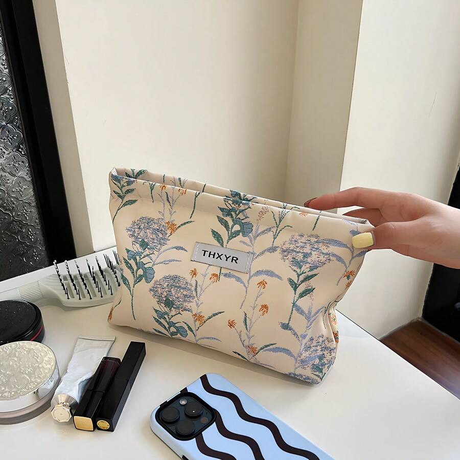 SHEIN حقيبة مكياج زرقاء واسعة بطبعة زهور أنيقة