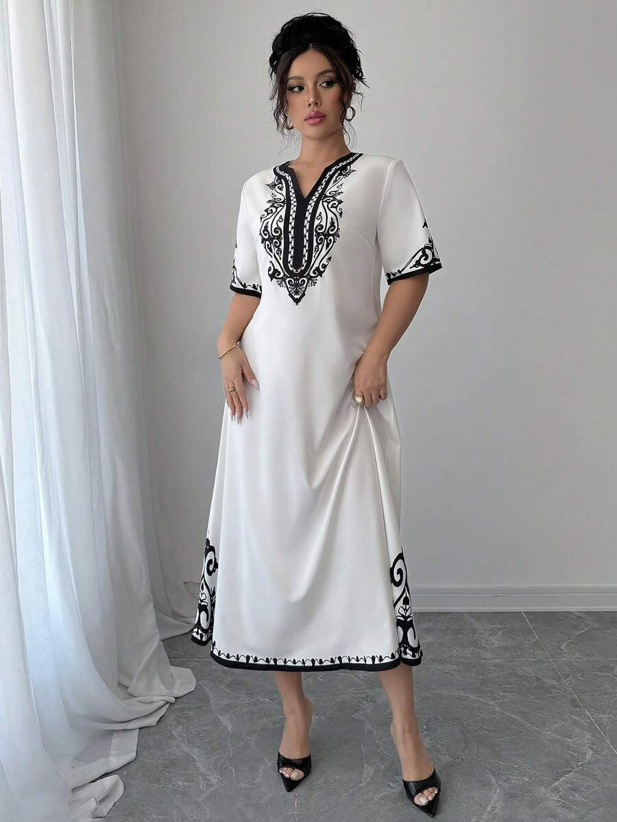 SHEIN Elenzga  فستان أنثوي أبيض بنقشات جذابة