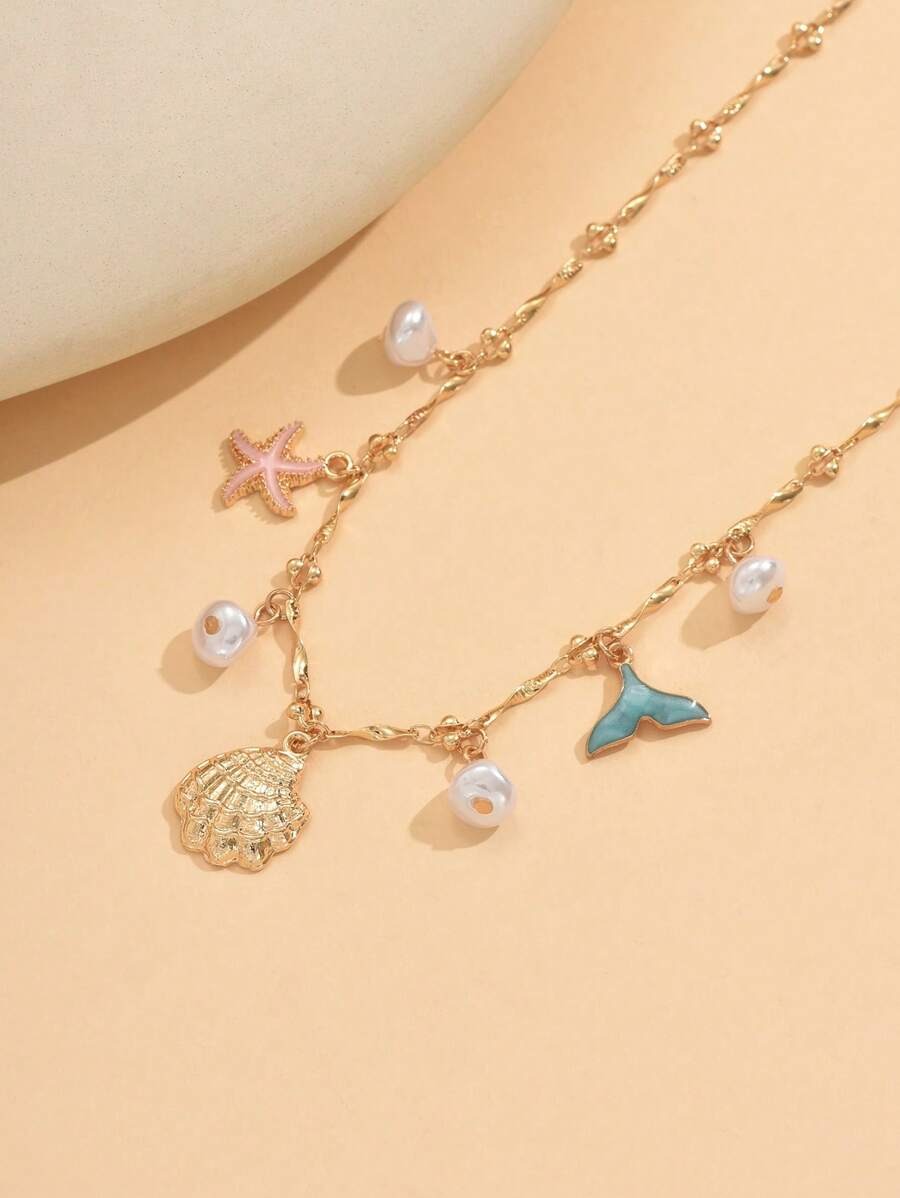 SHEIN  قلادة ناعمة  بأشكال نجم البحر و الصدف