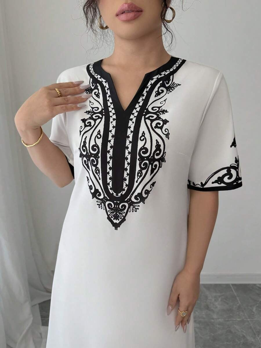 SHEIN Elenzga  فستان أنثوي أبيض بنقشات جذابة