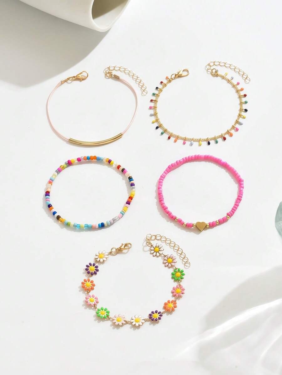 SHEIN طقم 5 أساور زهور الأقحوان خرز وزيتية
