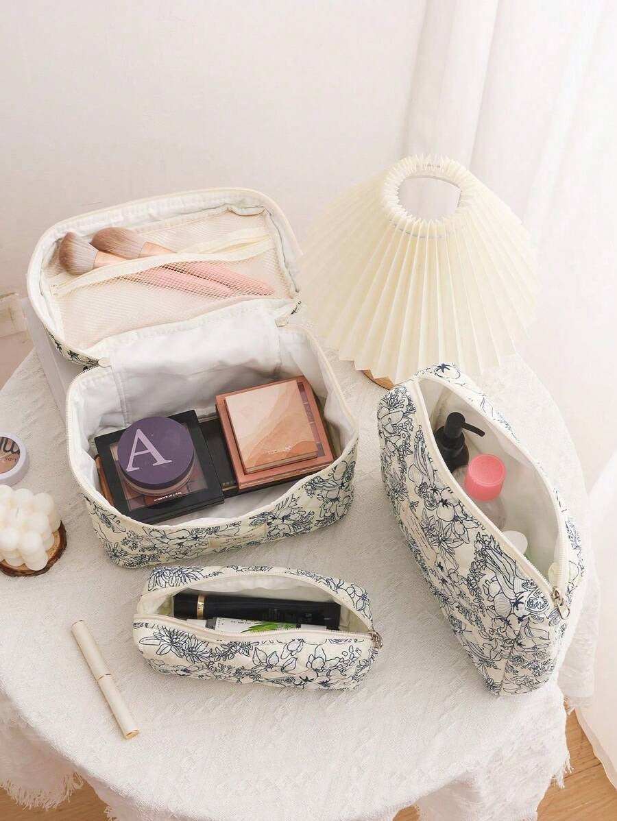 SHEIN حقيبة مكياج بطباعة زهور ولون أزرق بحري