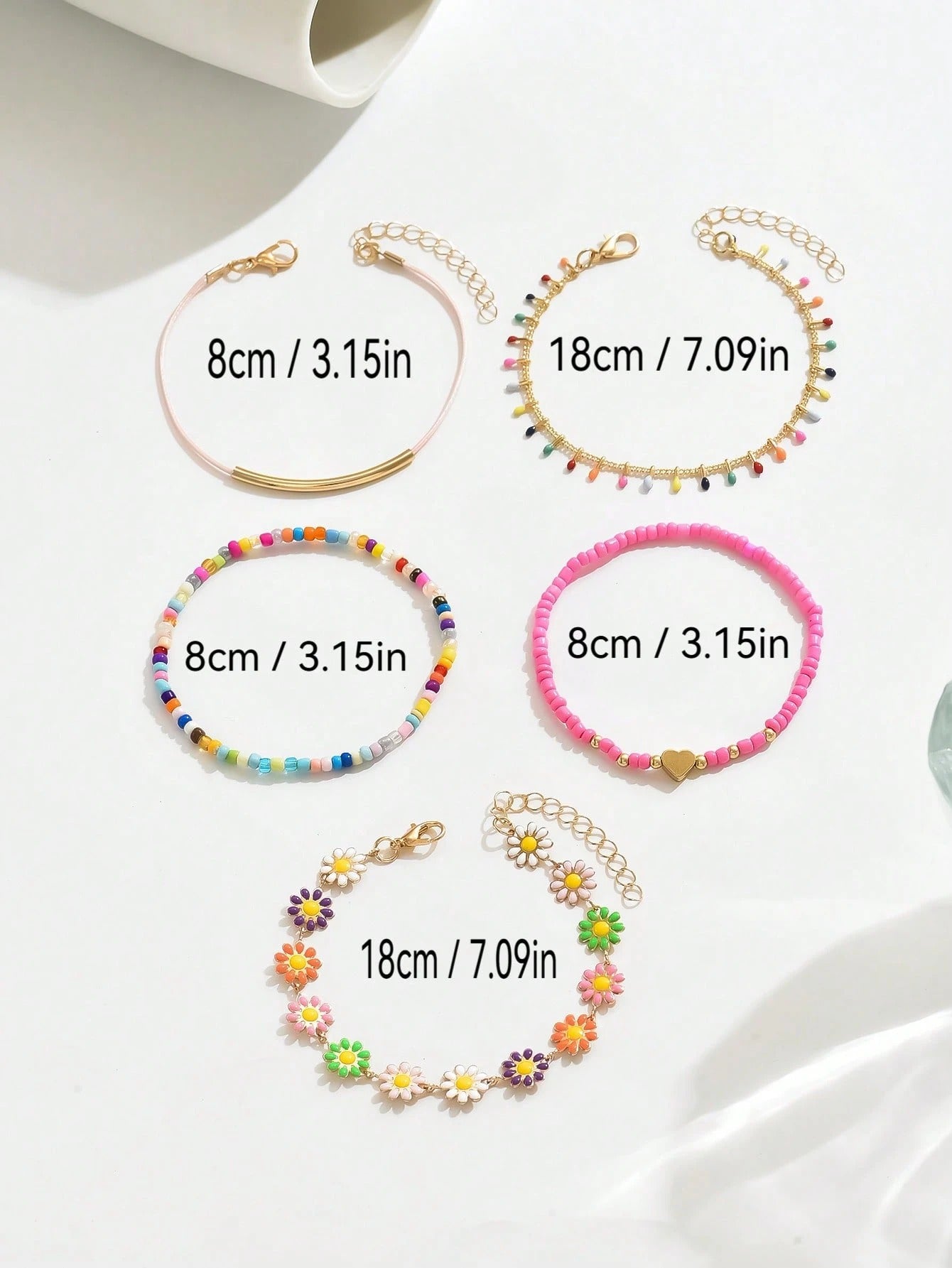SHEIN طقم 5 أساور زهور الأقحوان خرز وزيتية