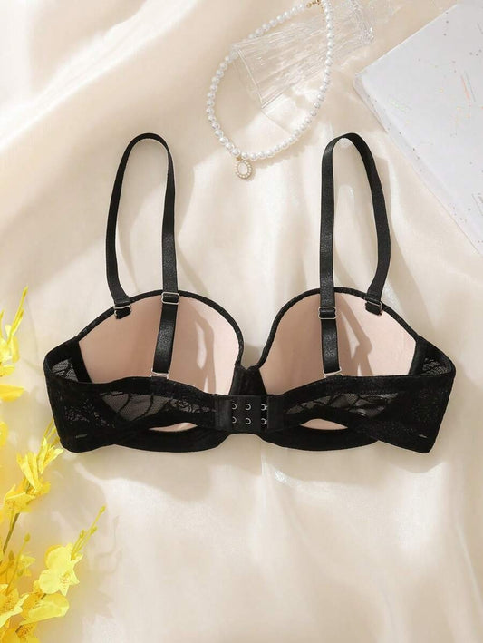 SHEIN صدرية سوداء أنيقة بزخرفة زهرية