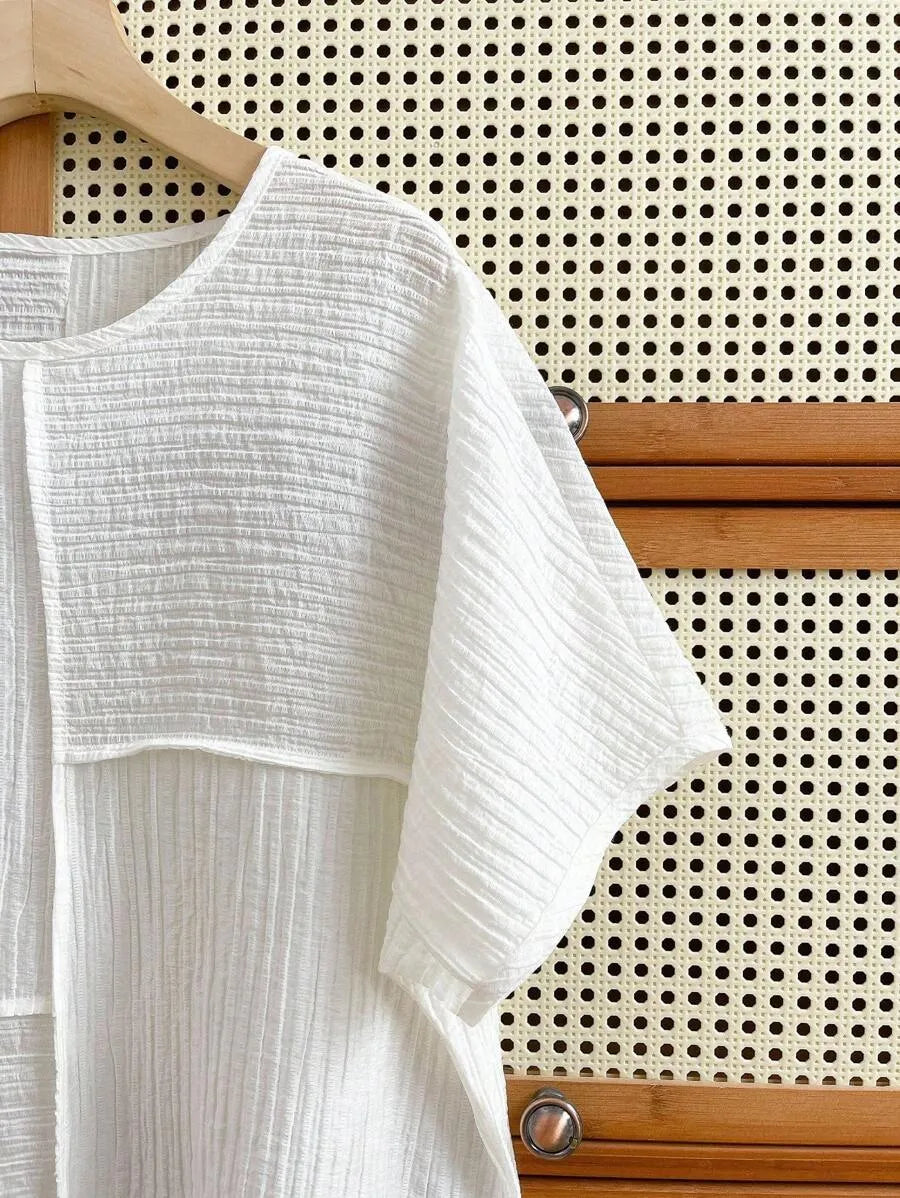 SHEIN INAWLY بلوزة صيفية واسعة بياقة دائرية وقماش مجعد