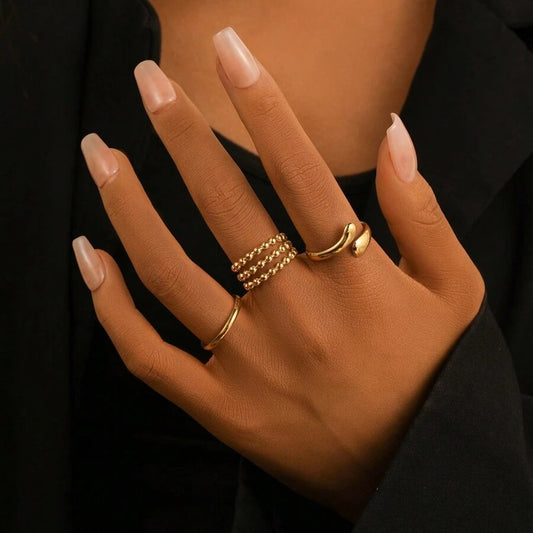 SHEIN طقم 3 خواتم ذهبية بتصميم موجة من الستانلس ستيل