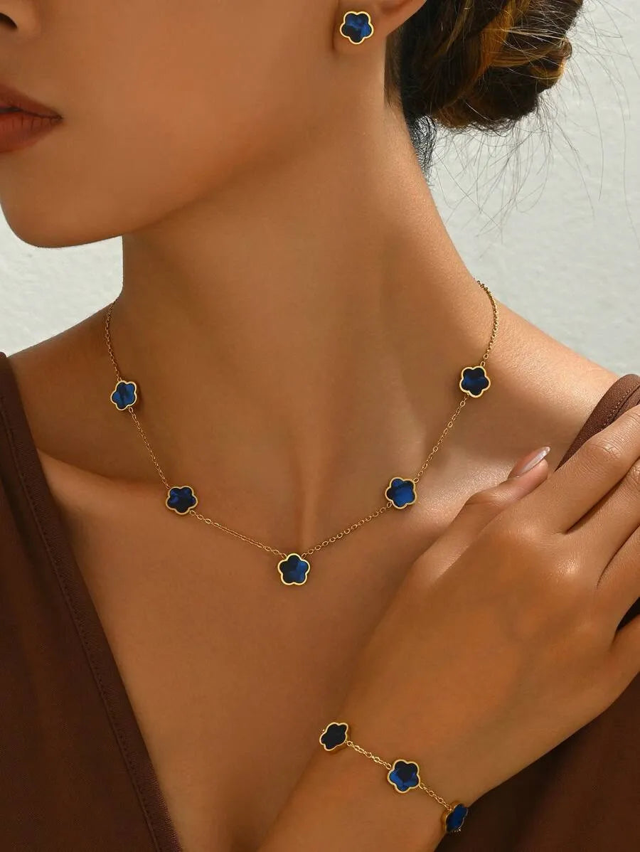 SHEIN طقم مجوهرات نسائي 4 قطع يضم أقراط وسوار وقلادة بتصميم زهرة بلون ذهبي وأزرق