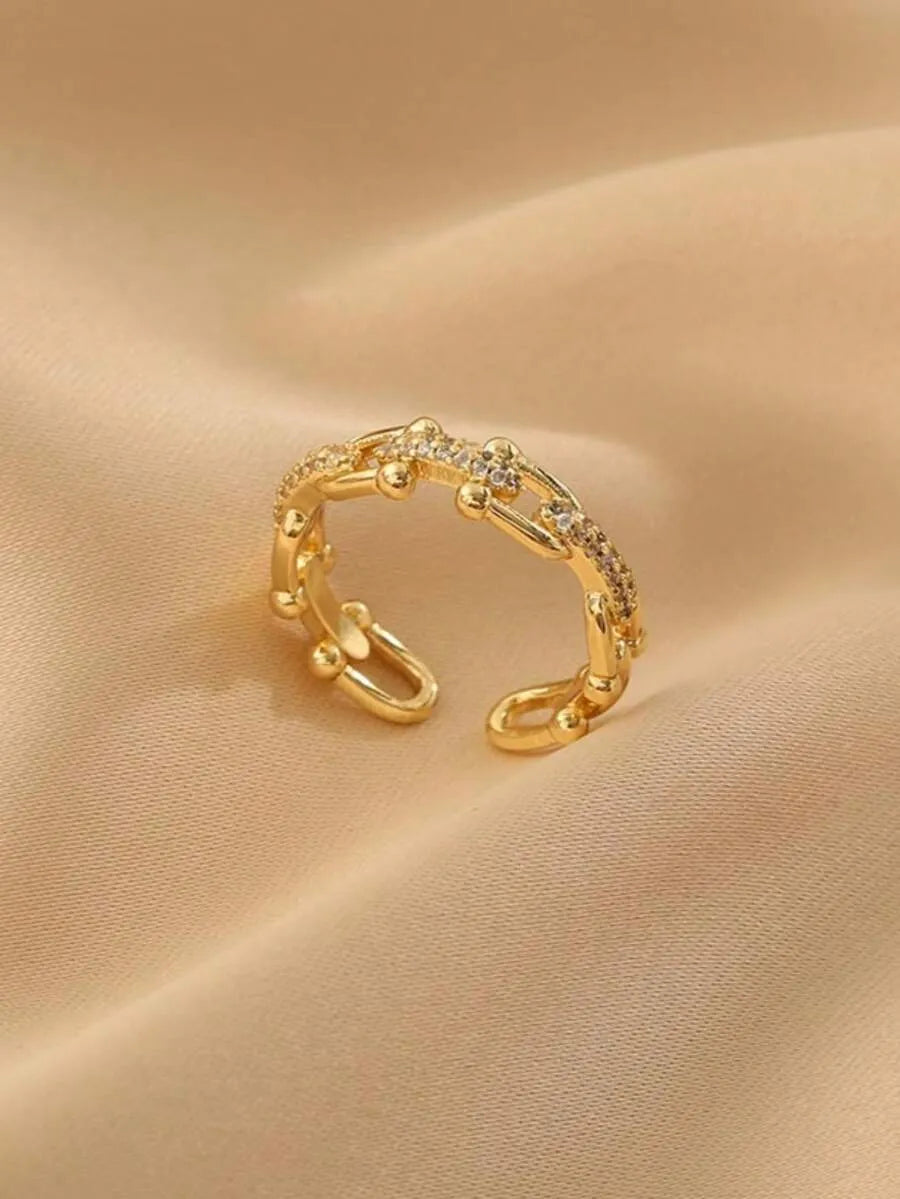SHEIN خاتم نسائي مفتوح بتصميم حرف U مزين بالزركونيا بلون ذهبي