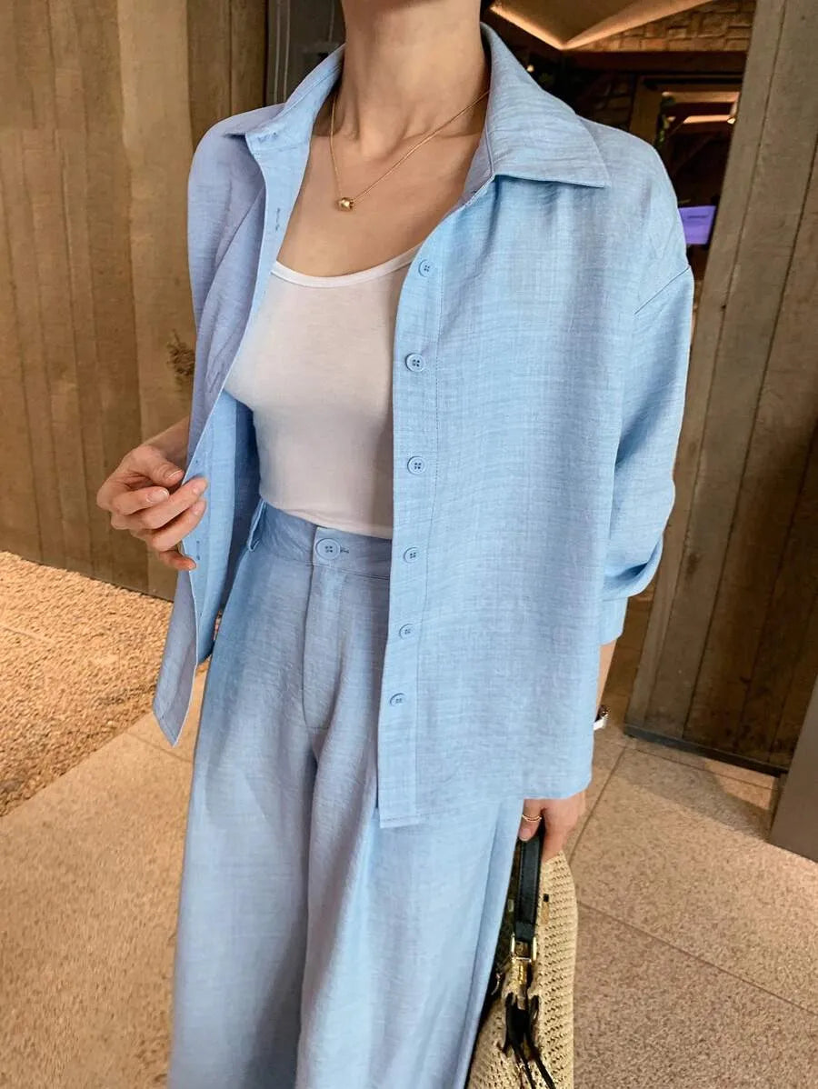 SHEIN DAZY طقم نسائي قطعتين بلوزة بياقة وأزرار أمامية وبنطال بجيوب بلون أزرق