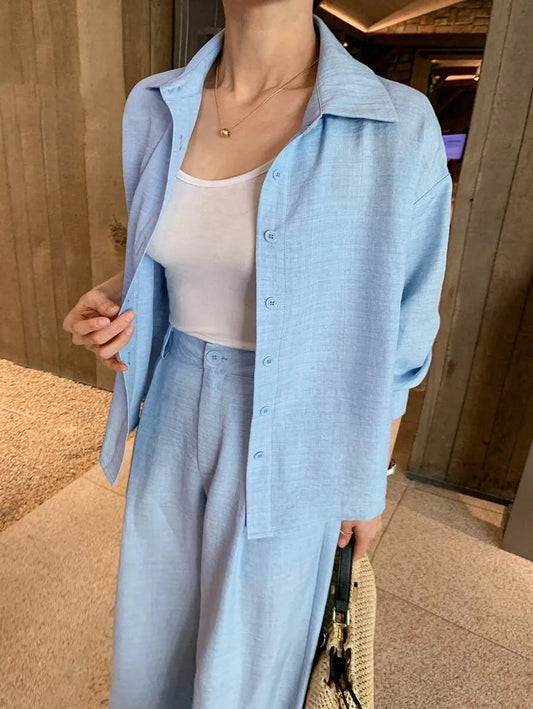 SHEIN DAZY طقم نسائي قطعتين بلوزة بياقة وأزرار أمامية وبنطال بجيوب بلون أزرق
