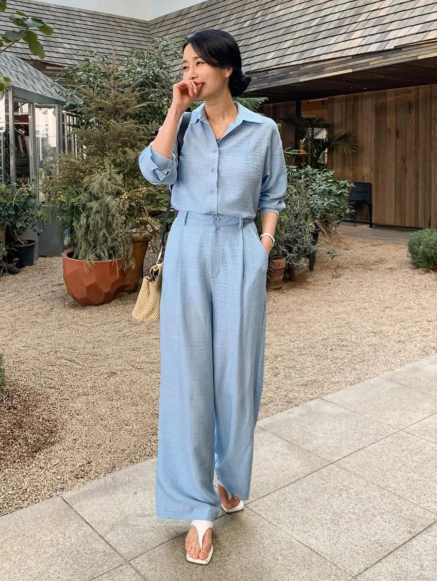 SHEIN DAZY طقم نسائي قطعتين بلوزة بياقة وأزرار أمامية وبنطال بجيوب بلون أزرق