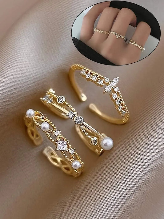 SHEIN مجموعة 3 خواتم نسائية بتصميم تاج متقاطع مزينة باللؤلؤ والزركونيا بلون ذهبي أصفر