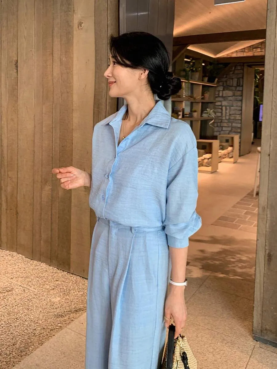 SHEIN DAZY طقم نسائي قطعتين بلوزة بياقة وأزرار أمامية وبنطال بجيوب بلون أزرق