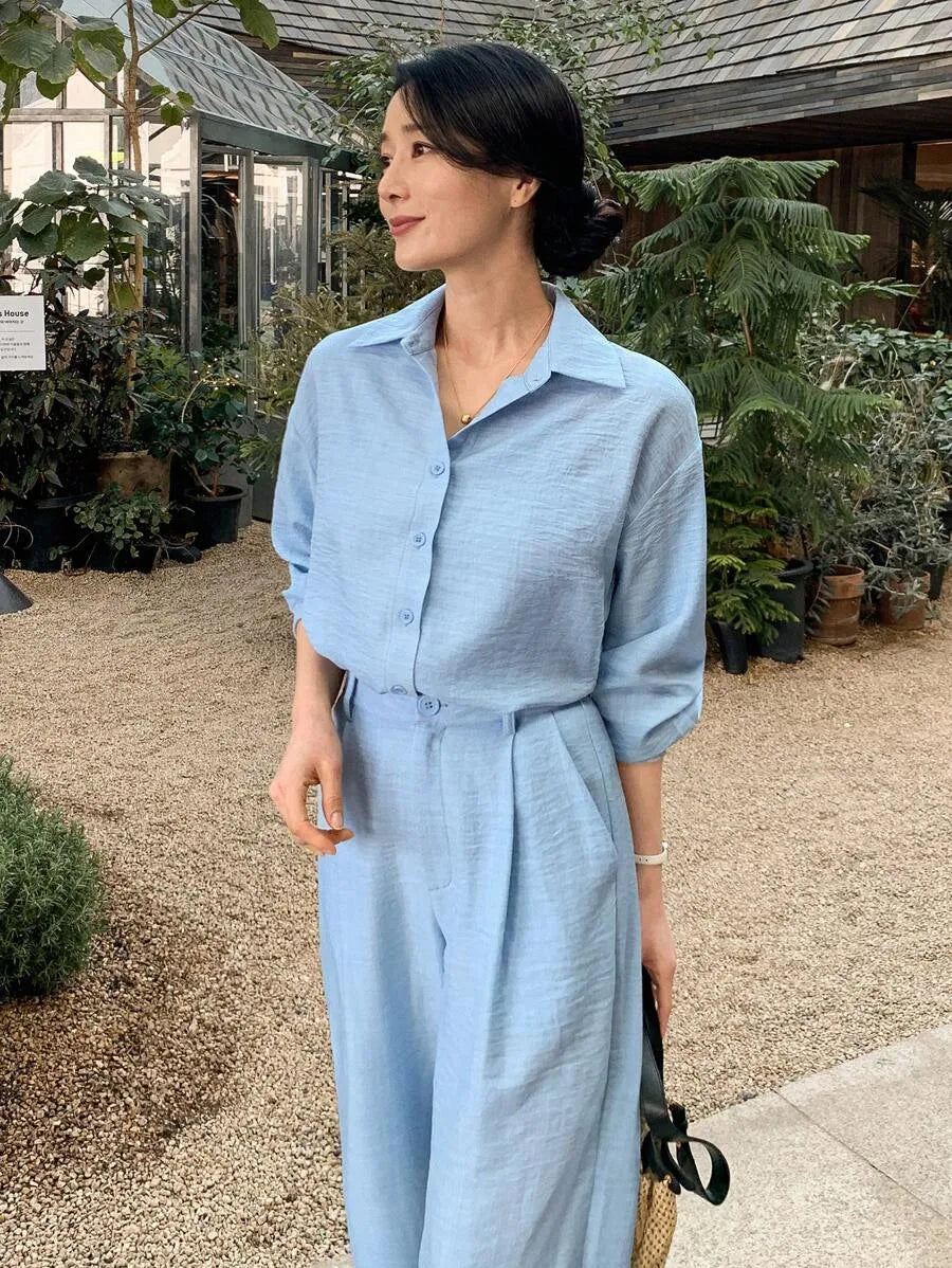 SHEIN DAZY طقم نسائي قطعتين بلوزة بياقة وأزرار أمامية وبنطال بجيوب بلون أزرق