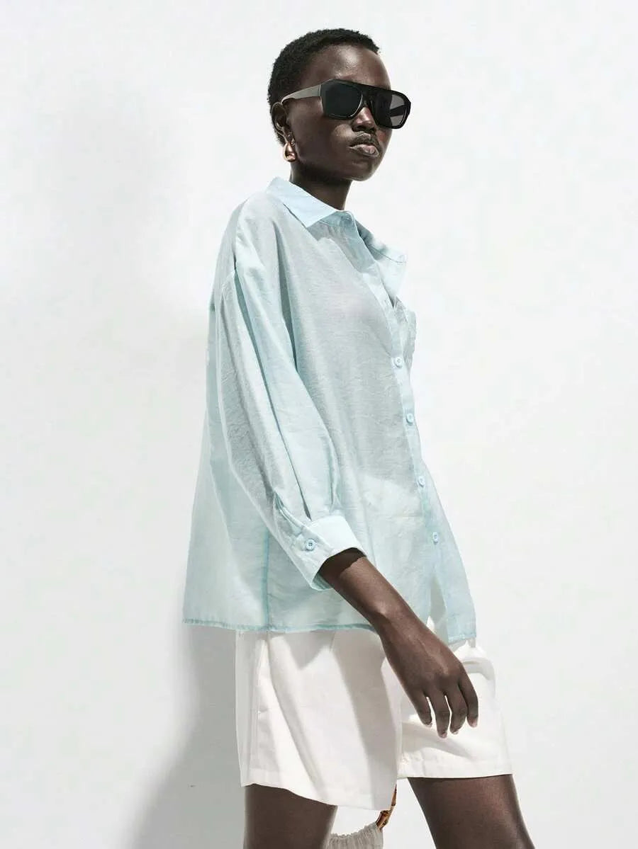 SHEIN Lumivelle قميص نسائي فضفاض شفاف بأزرار وجيب وأكمام 3/4 بلون أزرق