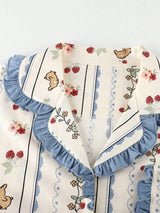 SHEIN طقم بيجامة قطعتين بقميص بياقة وأزرار أمامية وحافة مكشكشة ونقشة أرنب كرتوني وبنطال طويل بلون أزرق فاتح
