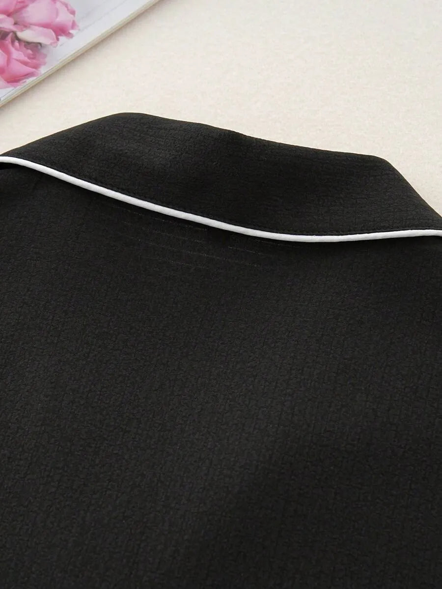 SHEIN طقم بيجامة قطعتين توب بأكمام قصيرة وشورت بلون أسود