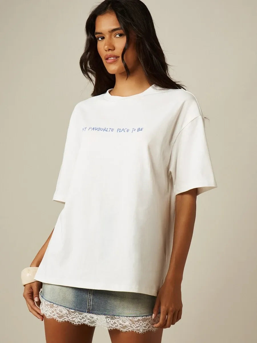 SHEIN MISSGUIDED تي شيرت نسائي أوفر سايز بأكمام قصيرة وطبعة شمسية على الظهر بلون أبيض