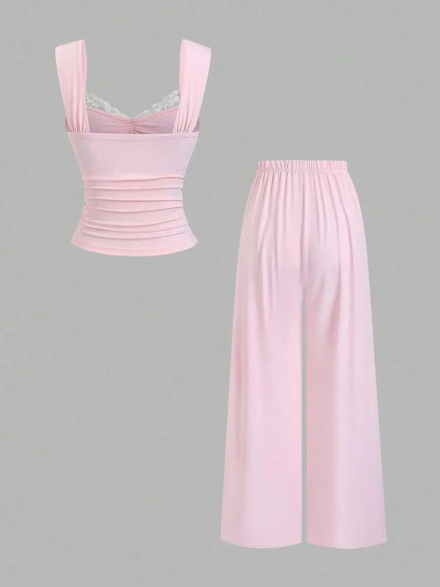 SHEIN طقم نسائي قطعتين (توب بدون أكمام بدانتيل وزهرة + بنطلون واسع الساق)