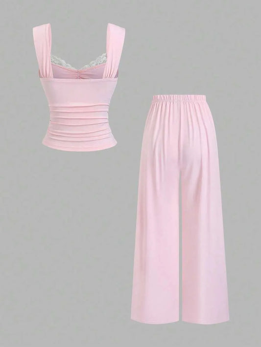 SHEIN طقم نسائي قطعتين (توب بدون أكمام بدانتيل وزهرة + بنطلون واسع الساق)