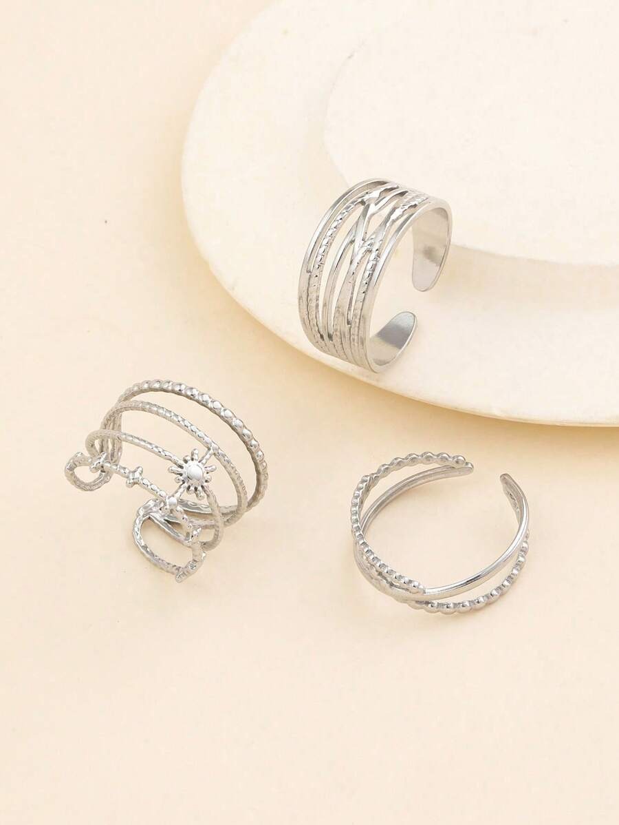 SHEIN طقم 3 خواتم فضية بشكل زهرة