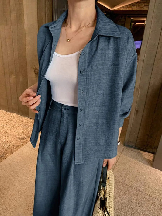 SHEIN DAZY طقم نسائي قطعتين بلوزة بأزرار أمامية وبنطال طويل بجيوب بلون أزرق بحري