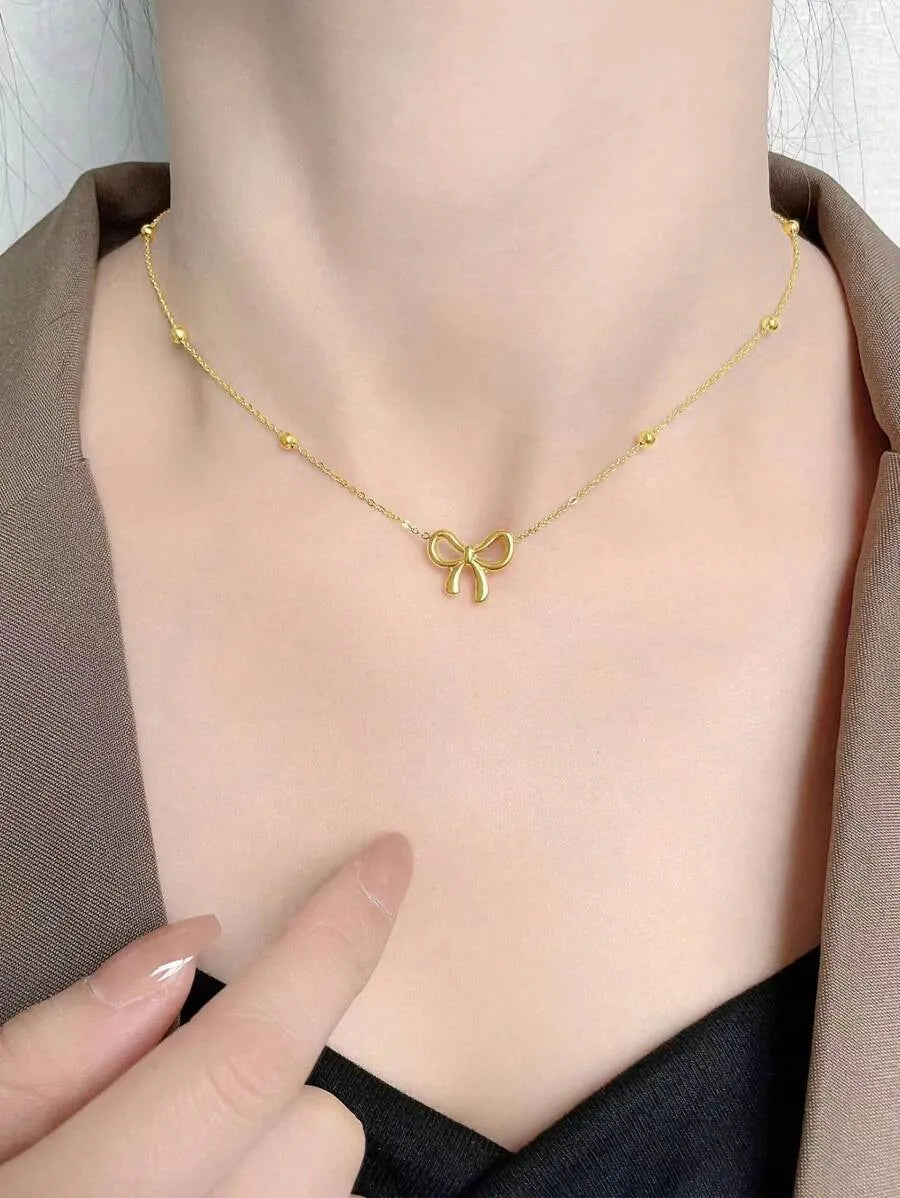 SHEIN طقم مجوهرات بتصميم فيونكة من الفولاذ المقاوم للصدأ