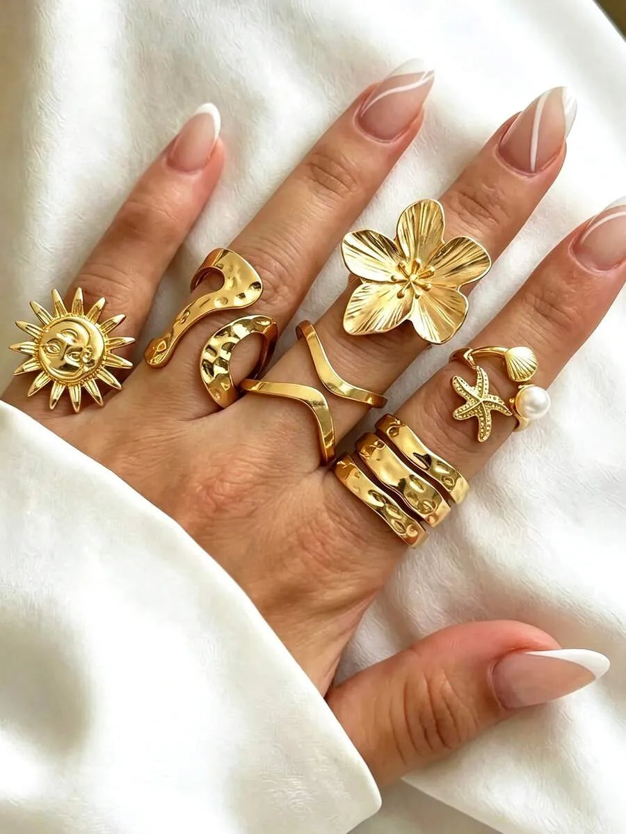 SHEIN  خواتم نسائية بتصميم بوهو غير متماثل مزينة باللؤلؤ الصناعي والأصداف بلون ذهبي