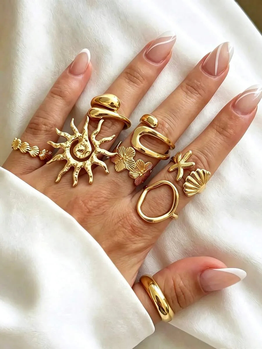 SHEIN  خواتم نسائية بتصميم بوهو غير متماثل مزينة باللؤلؤ الصناعي والأصداف بلون ذهبي
