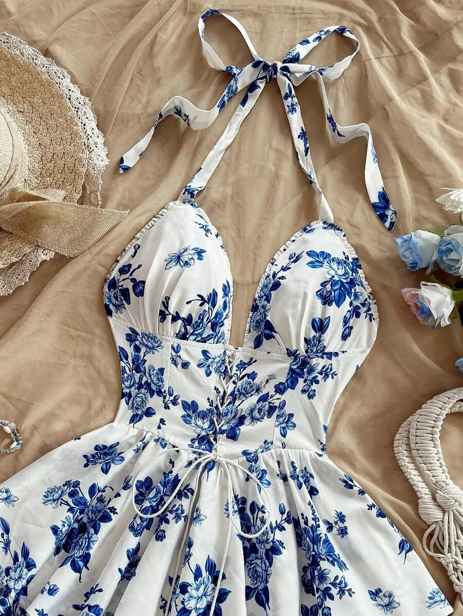 SHEIN Soleia فستان متعدد الألوان ميني واسع بحمالات رقبة هالتر ورباط بطبعة زهور