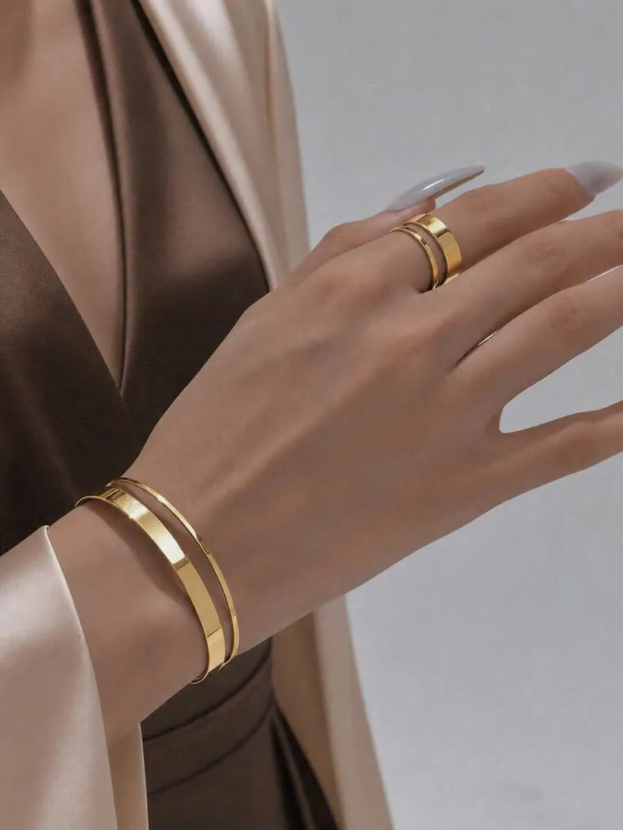 SHEIN طقم سوار وخاتم نسائي بتصميم هندسي متموج بلون ذهبي