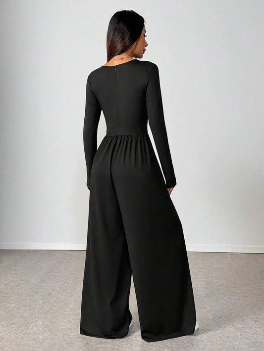 SHEIN Unity جمبسوت نسائي بياقة دائرية وأكمام طويلة بلون الأسود