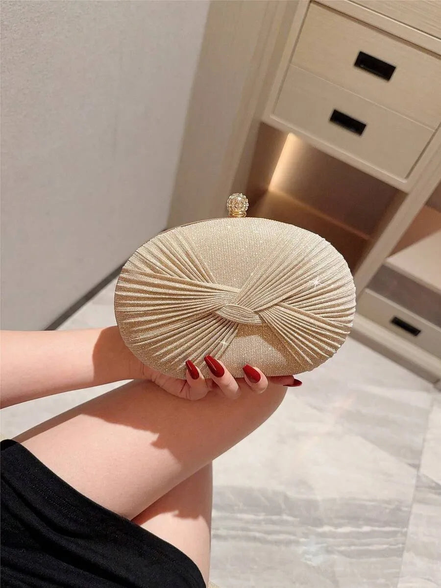 SHEIN حقيبة كلاتش بيضاوية صغيرة لامعة بفيونكة ورصاص ألماسي