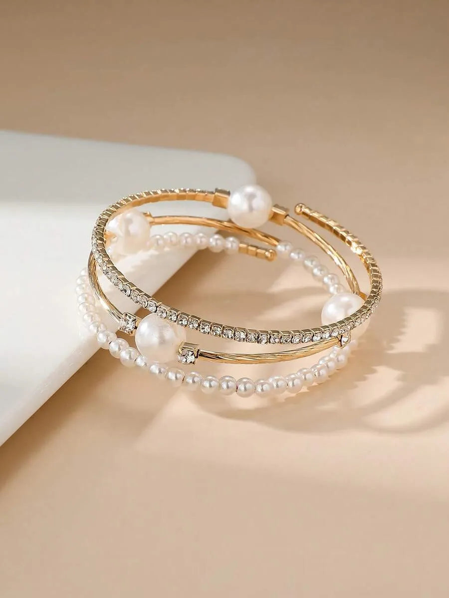 SHEIN سوار نسائي رفيع مفتوح مزين باللؤلؤ وحجر الراين بلون فضي