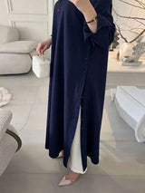 SHEIN قميص طويل فضفاض بياقة كلاسيكية وأزرار أمامية وفتحات جانبية بلون أزرق غامق