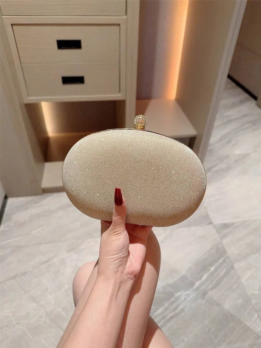 SHEIN حقيبة كلاتش بيضاوية صغيرة لامعة بفيونكة ورصاص ألماسي