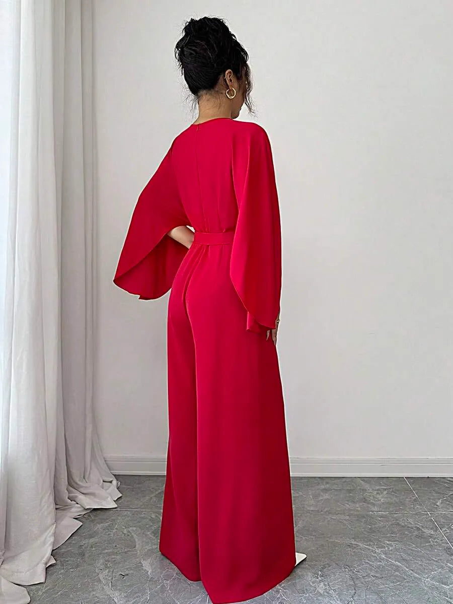 SHEIN Elenzga جمبسوت نسائي فضفاض بأكمام خفاش وحزام وتصميم متباين بلون أحمر
