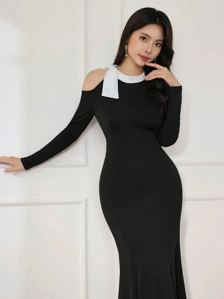 SHEIN Modelyn فستان طويل ضيق بياقة غير متماثلة وأكمام طويلة ورباط خلفي بتصميم متباين بالأبيض والأسود