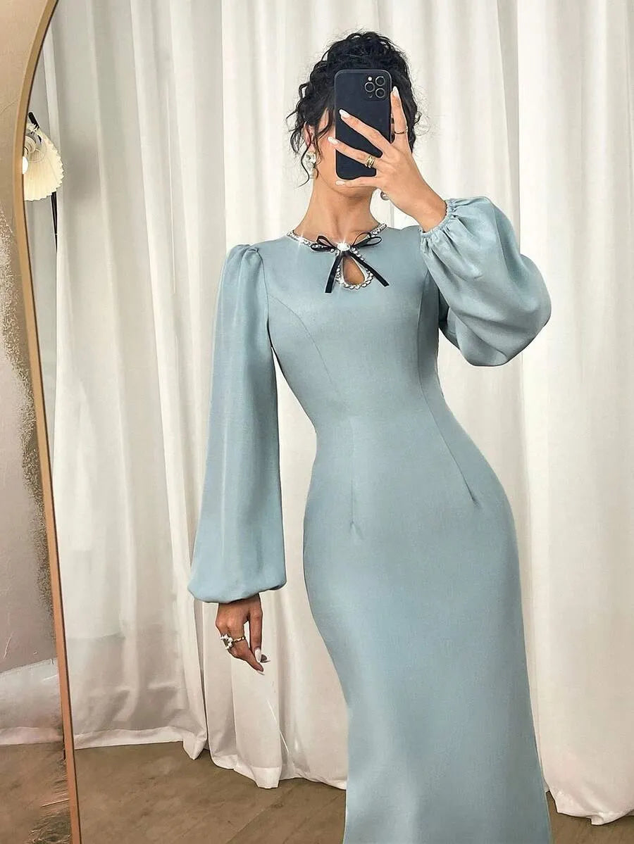 SHEIN Modelyn فستان طويل بياقة هالتر وفيونكة وأكمام طويلة منفوشة وفتحة جانبية بلون أخضر نعناعي
