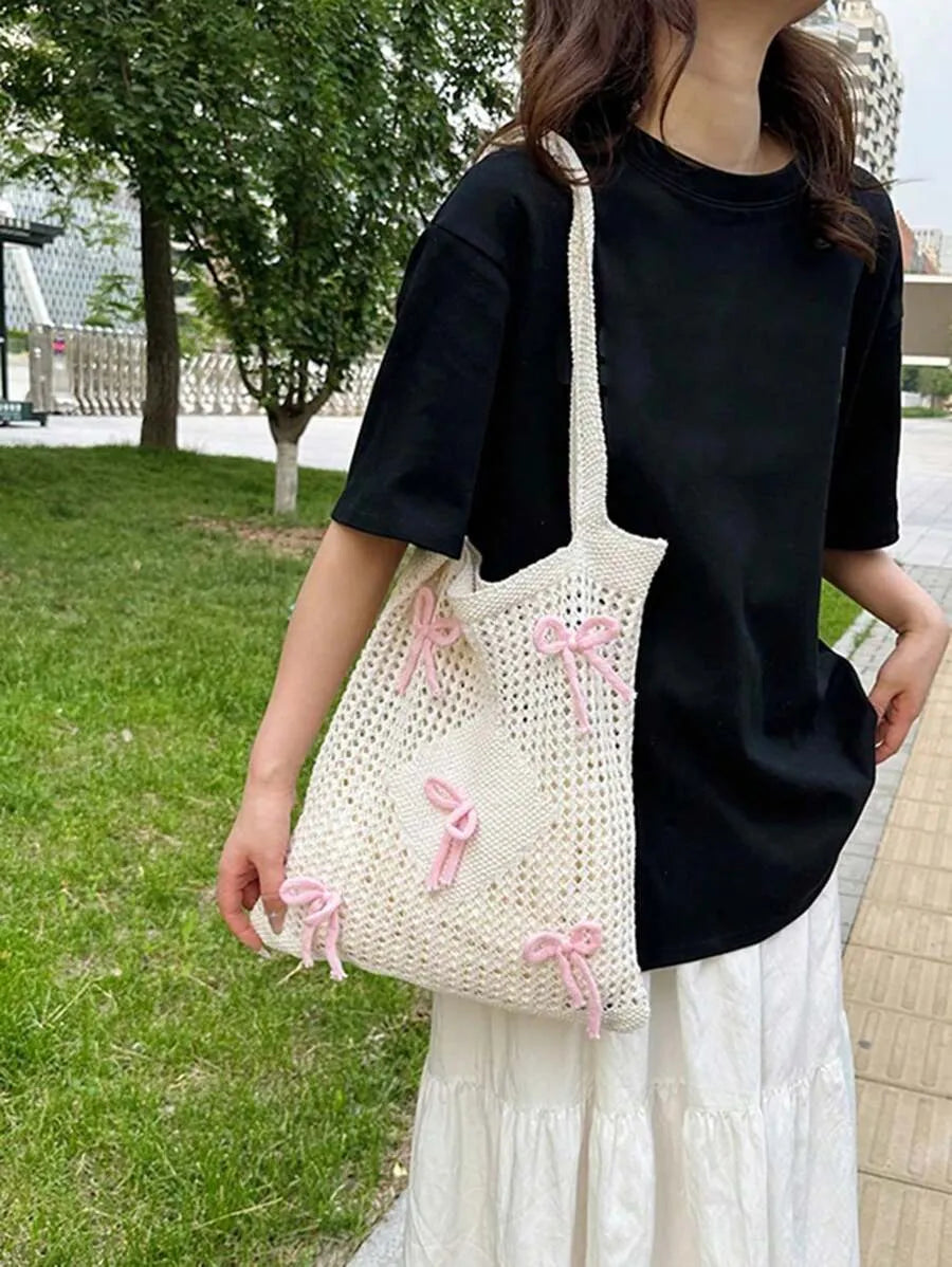SHEIN حقيبة شاطئ وكتف كروشيه متوسطة الحجم بفيونكات وردية تصميم مفرغ
