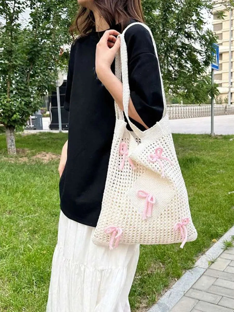 SHEIN حقيبة شاطئ وكتف كروشيه متوسطة الحجم بفيونكات وردية تصميم مفرغ