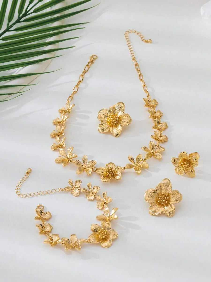 SHEIN طقم مجوهرات نسائي 4 قطع بتصميم زهرة خماسية البتلات بلون ذهبي